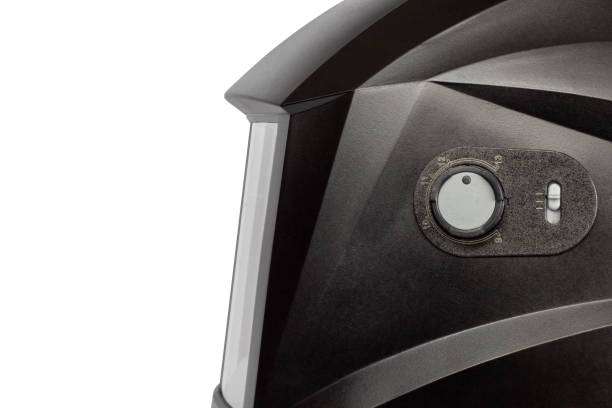 Close-up of a black welding helmet showing side controls and a clear viewing area.