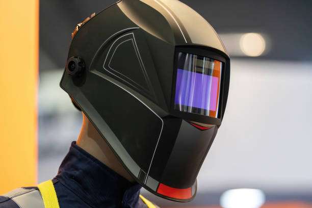 Side view of a welding helmet on a mannequin.